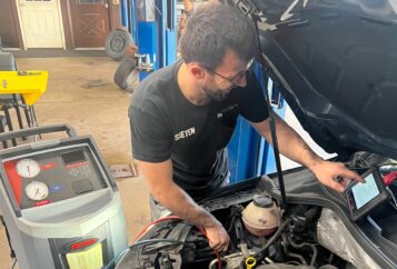 Mechanic checking the heating and air conditioning system