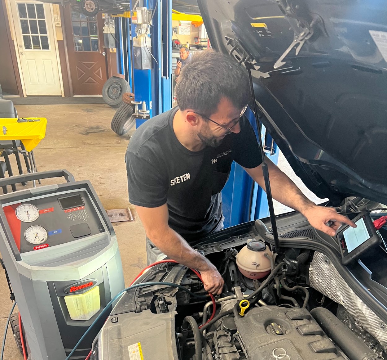 Mechanic checking the heating and air conditioning system