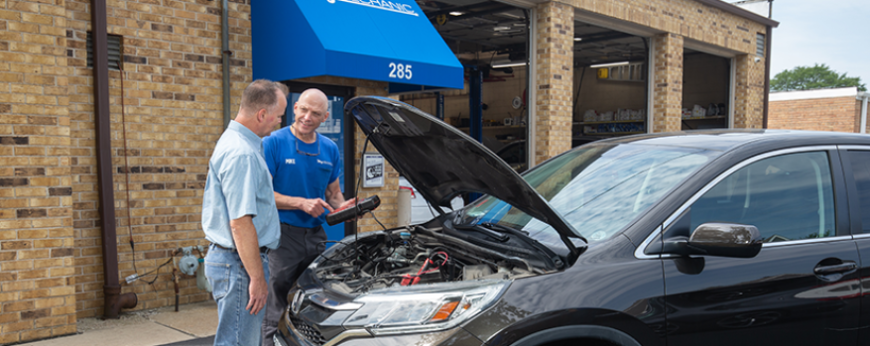 My Mechanic Technician showing customer their engine diagnostic test